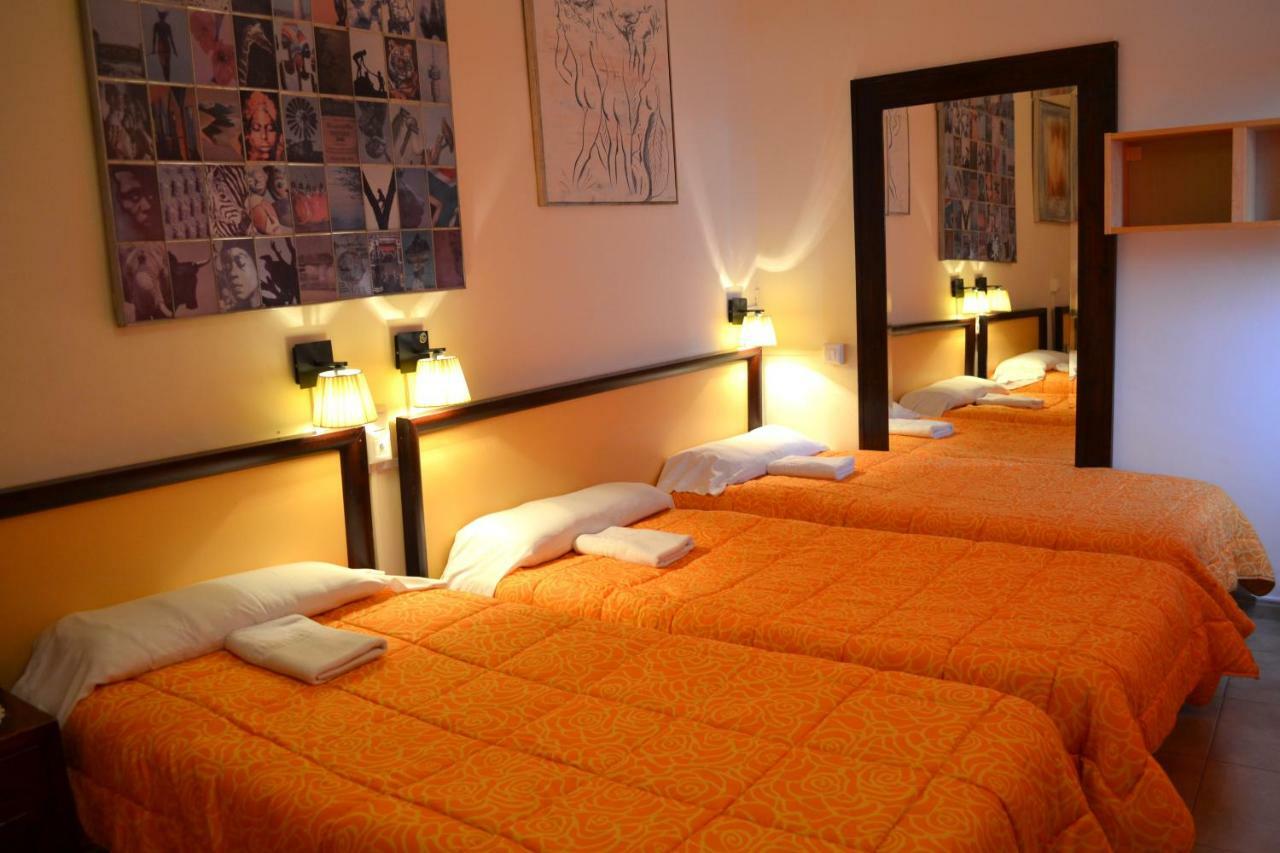 Habitación Doble con cama supletoria (3 adultos) y baño
